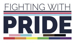 The Fighting With Pride (FWP) charity logo, which features the charity name. Below the words "Fighting With" are three lines, the top one dark blue, the middle one red and the bottom one light blue, with gaps of white between them. Underneath the word "Pride" is a line split into five blocks of colour: pale pink, pale blue, white, brown and black, which represents the Progress transgender pride flag and the pride flag for people of colour. Below that is a line split into six blocks of colour: red, orange, yellow, green, dark blue and purple, which represents the colours of the pride flag. | VOS