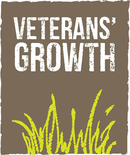 The Veterans' Growth charity logo. It has a pale brown background with the words "Veterans' Growth" in white at the top and a cartoon style graphic of some blades of grass in lime green. | VOS