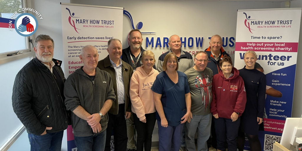 VOS members standing with VOS and Mary How Trust staff.