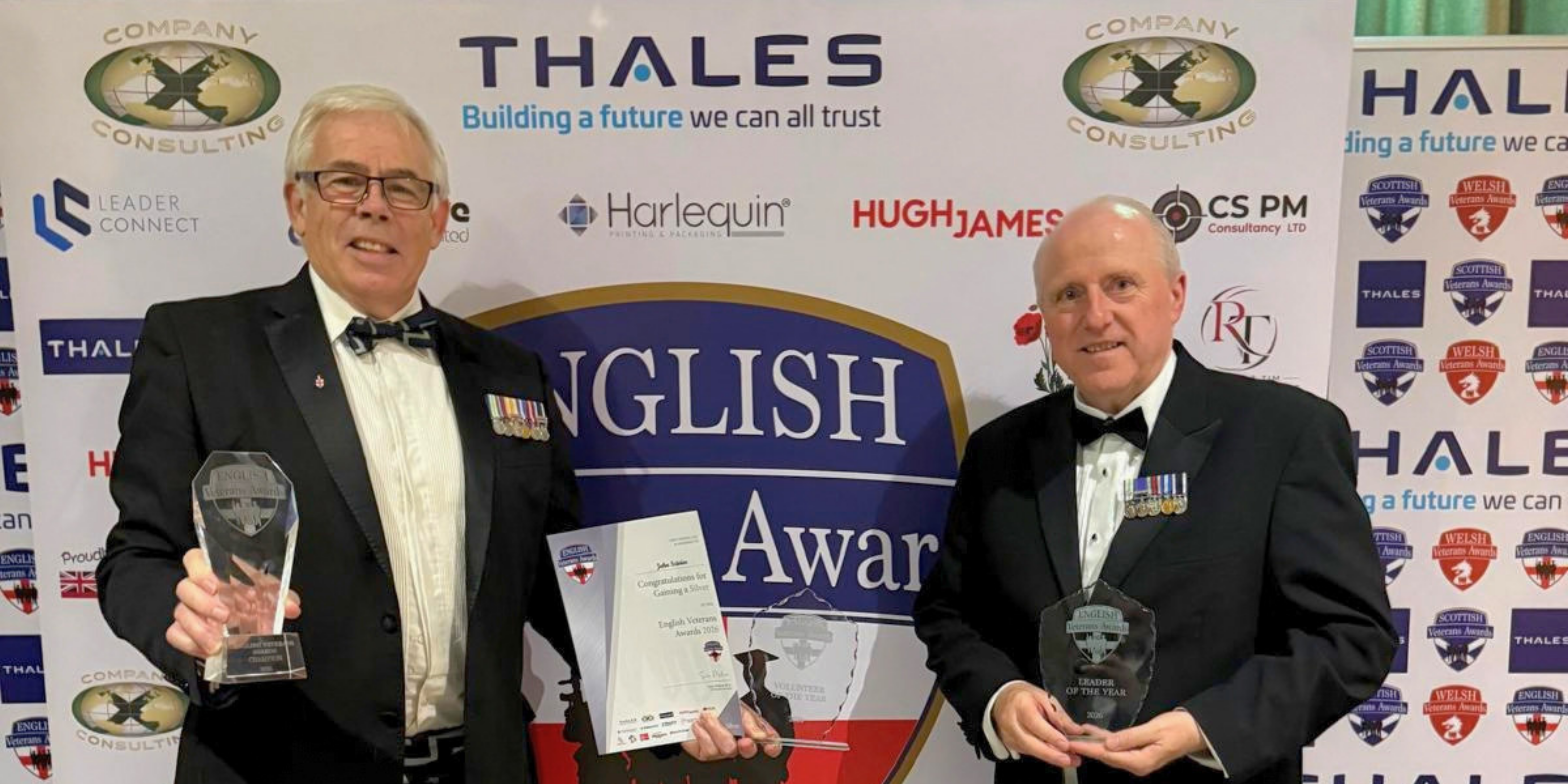 John Scivier and Ian Millen holding their awards.